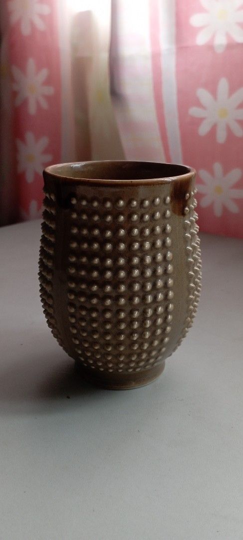 Textured Ceramic Pot (Category: Pots & Planters) located in Manila. Submitted by cool_niacene15 (Listing ID 1438967079, Image 2). Description: - Textured ceramic pot - Brown color with a lighter rim - Round shape with a wide opening - Suitable for small plants or decoration - 11 cm .