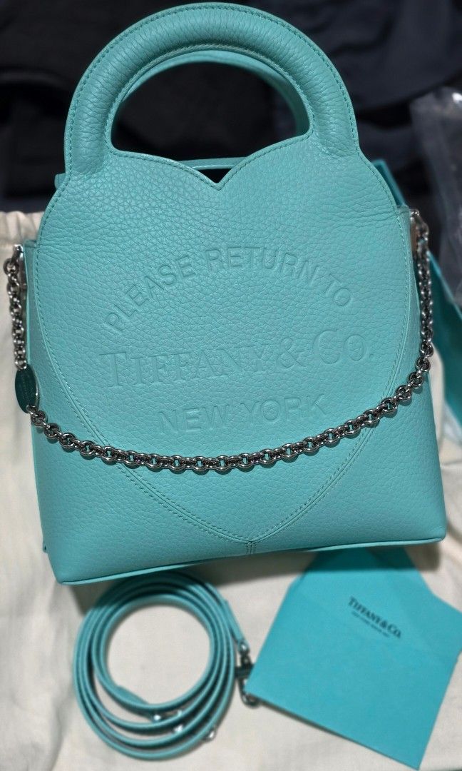 Tiffany & Co Return to Tiffany (Category: Luxury Bags & Wallets) located in Taguig. Submitted by Cruise2019 (Listing ID 1439054779, Image 1). Description: NWT Tiffany & Co Return to Tiffany purse. Highly sought after color, 💎💎Tiffany Blue💎💎 Comes with both straps, card and dust bag. FIRM ON PRICE.
