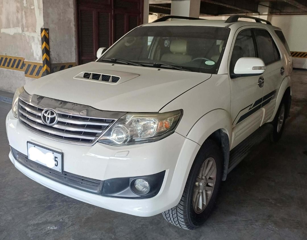 Toyota Fortuner V Auto (Category: Used Cars) located in Manila. Submitted by spawn888 (Listing ID 1439031263, Image 2). Description: 2012 Toyota Fortuner V For Sale! Ending plate is 5 SUV, Diesel, Freedom White 40K Low Mileage only automatic seat, windows top of the line Please contact me at 0922-4292167. thank you!.
