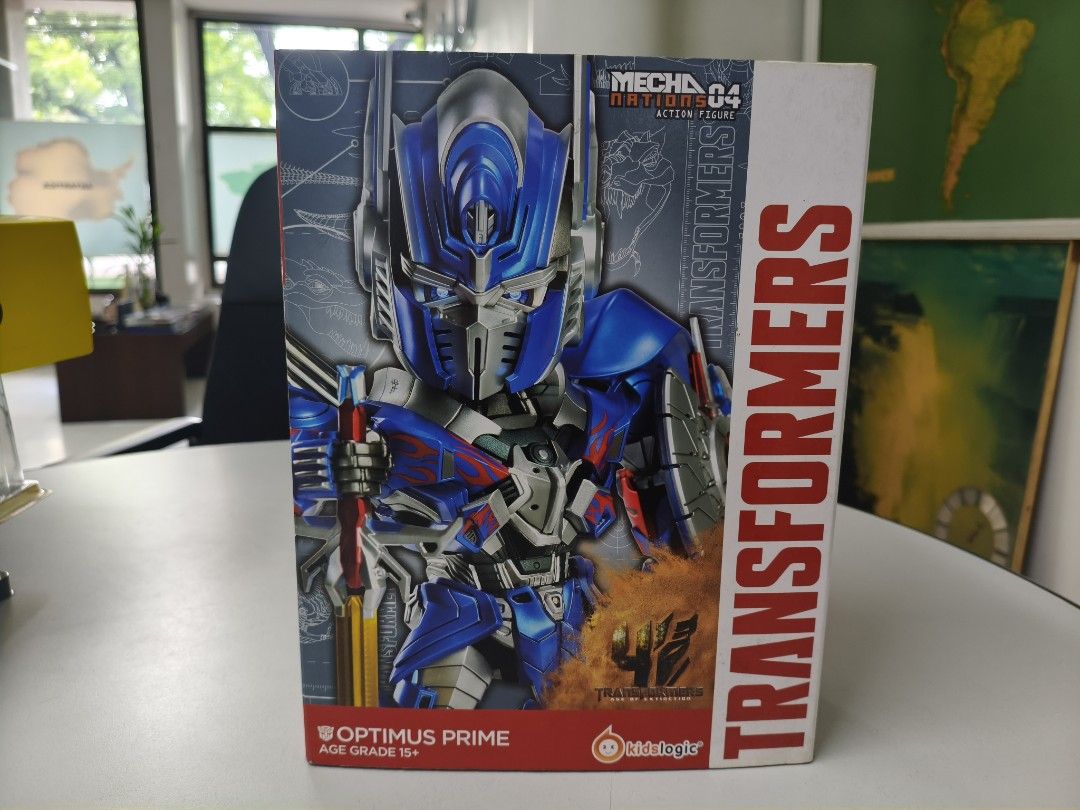 Transformers Optimus Prime Mecha 04 Action Figure (Category: Action & Battle Toys) located in Manila. Submitted by kuyaaaedric (Listing ID 1438886164, Image 1). Description: - Transformers Optimus Prime Mecha 04 Action Figure - From the 4th Anniversary Collection - 25 Articulated Joints for Dynamic Posing - Includes Metal Finishing Stand Base - Comes with 6 Replaceable Heads - Features Shield and Sword (as shown on box) - Brand New in Original Pa