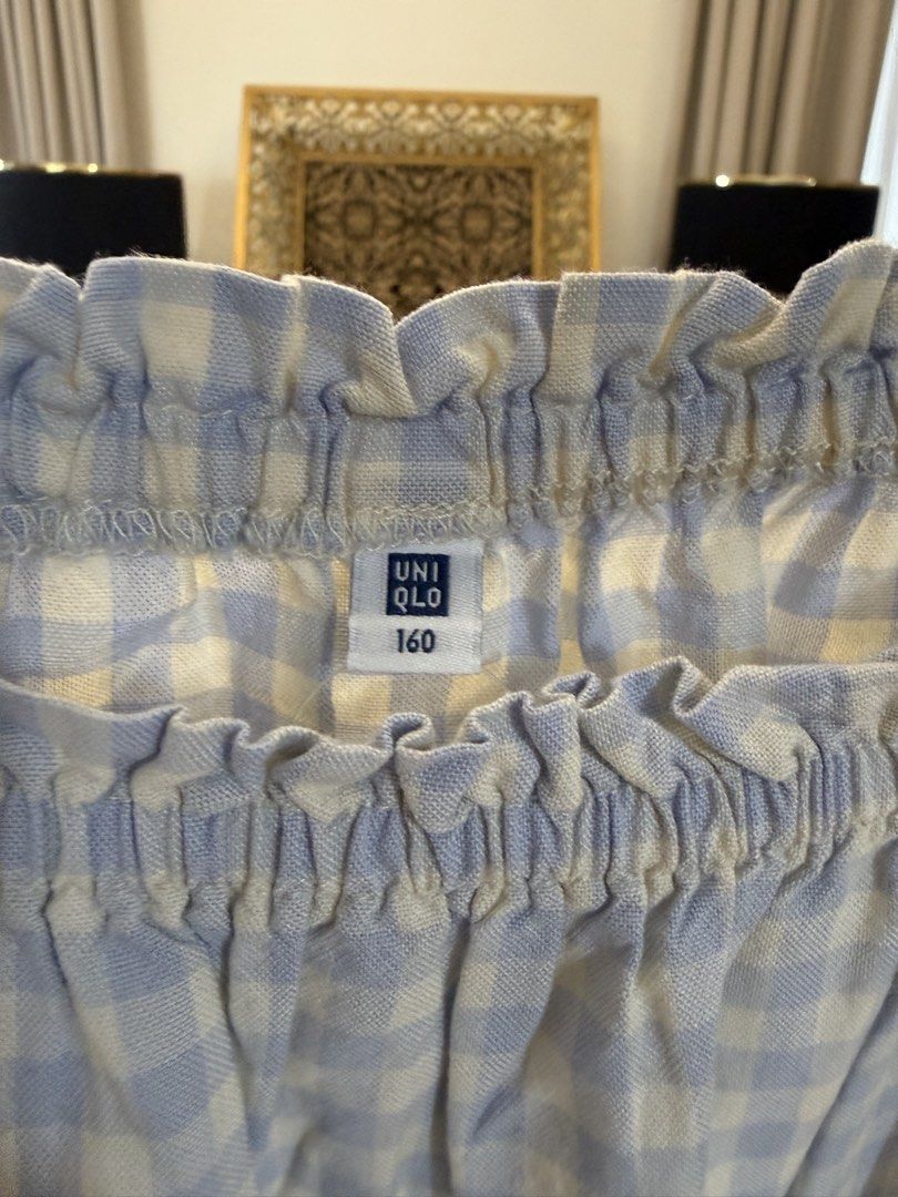 Uniqlo Gingham Dress (Category: Babies & Kids Fashion) located in Antipolo. Submitted by ibyangs_closet (Listing ID 1438951331, Image 2). Description: - Blue and white gingham pattern - Midi length dress - Size 160 - Short sleeves - Tie-waist design - Round neckline - Made of lightweight fabric, perfect for warm weather.