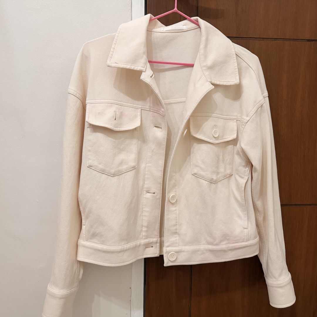 Uniqlo jersey relaxed Jacket - Cream (Category: Coats, Jackets and Outerwear) located in Quezon City. Submitted by jamilahlala01 (Listing ID 1439053418, Image 1). Description: - Uniqlo cream denim jacket - Size: S - Material: Cotton blend (cotton, nylon, spandex) - Features: Two chest pockets, button-down front, classic collar, long sleeves - Condition: Good Original Uniqlo! Never been used — got stained after laundry. Still have the original rec