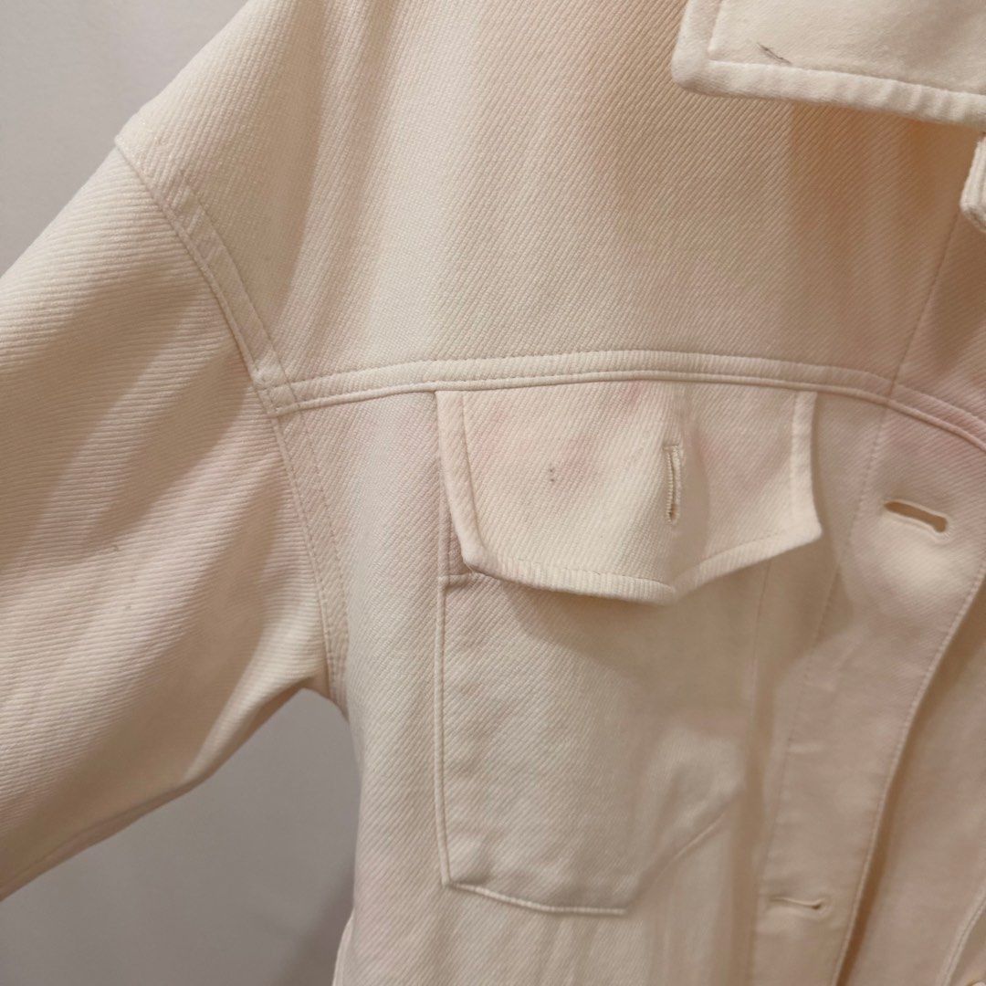 Uniqlo jersey relaxed Jacket - Cream (Category: Coats, Jackets and Outerwear) located in Quezon City. Submitted by jamilahlala01 (Listing ID 1439053418, Image 2). Description: - Uniqlo cream denim jacket - Size: S - Material: Cotton blend (cotton, nylon, spandex) - Features: Two chest pockets, button-down front, classic collar, long sleeves - Condition: Good Original Uniqlo! Never been used — got stained after laundry. Still have the original rec