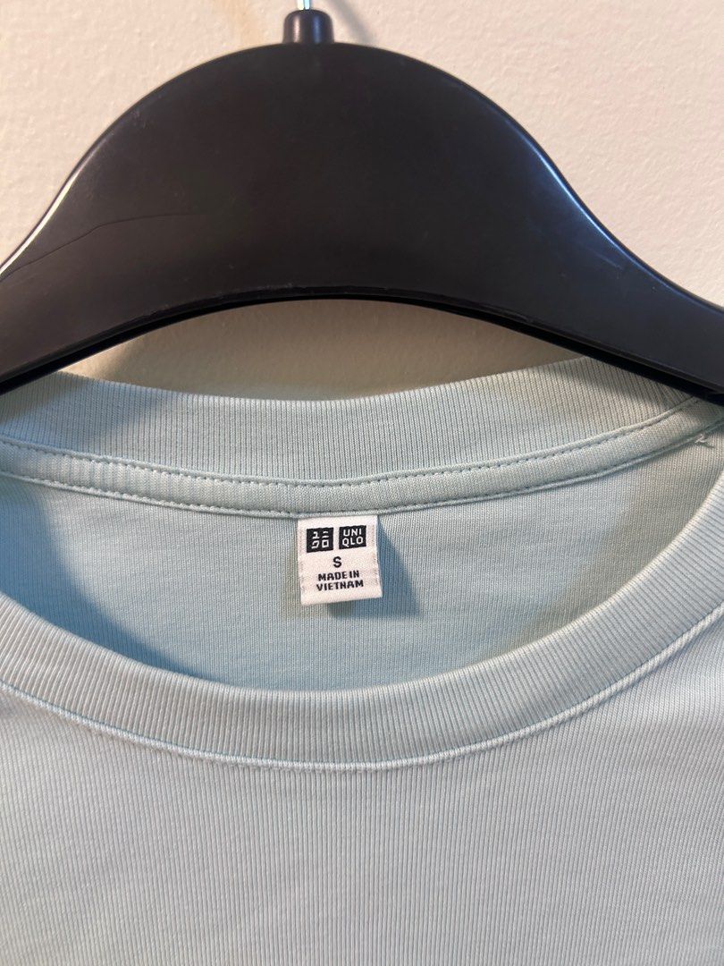 Uniqlo Light Blue Baby Tee (Category: Shirts) located in Makati City. Submitted by rkivegf_ (Listing ID 1439053965, Image 2). Description: — 120 + sf — size S on tag — Uniqlo — has a stain, barely visible (see slide 3) 🧾: payment first basis (GCash, BDO) 📦: lalamove / LBC (shouldered by buyer) 📍: makati, metro manila.