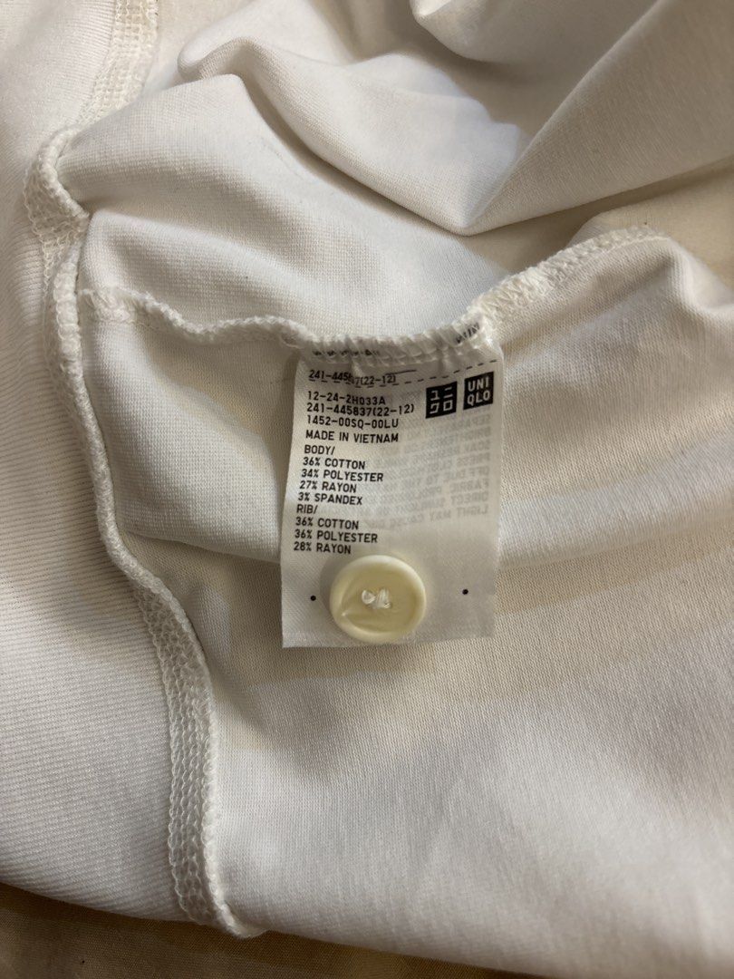 Uniqlo White Cardigan (Category: Coats, Jackets and Outerwear) located in Manila. Submitted by hanykokokoki (Listing ID 1439041631, Image 3). Description: - Uniqlo white cardigan - Round neck - Button-down closure - Made in Vietnam - Fabric: Cotton, polyester, spandex, rayon blend - Long sleeves - Relaxed fit - Great for layering.