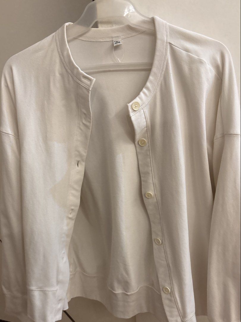 Uniqlo White Cardigan (Category: Coats, Jackets and Outerwear) located in Manila. Submitted by hanykokokoki (Listing ID 1439041631, Image 1). Description: - Uniqlo white cardigan - Round neck - Button-down closure - Made in Vietnam - Fabric: Cotton, polyester, spandex, rayon blend - Long sleeves - Relaxed fit - Great for layering.