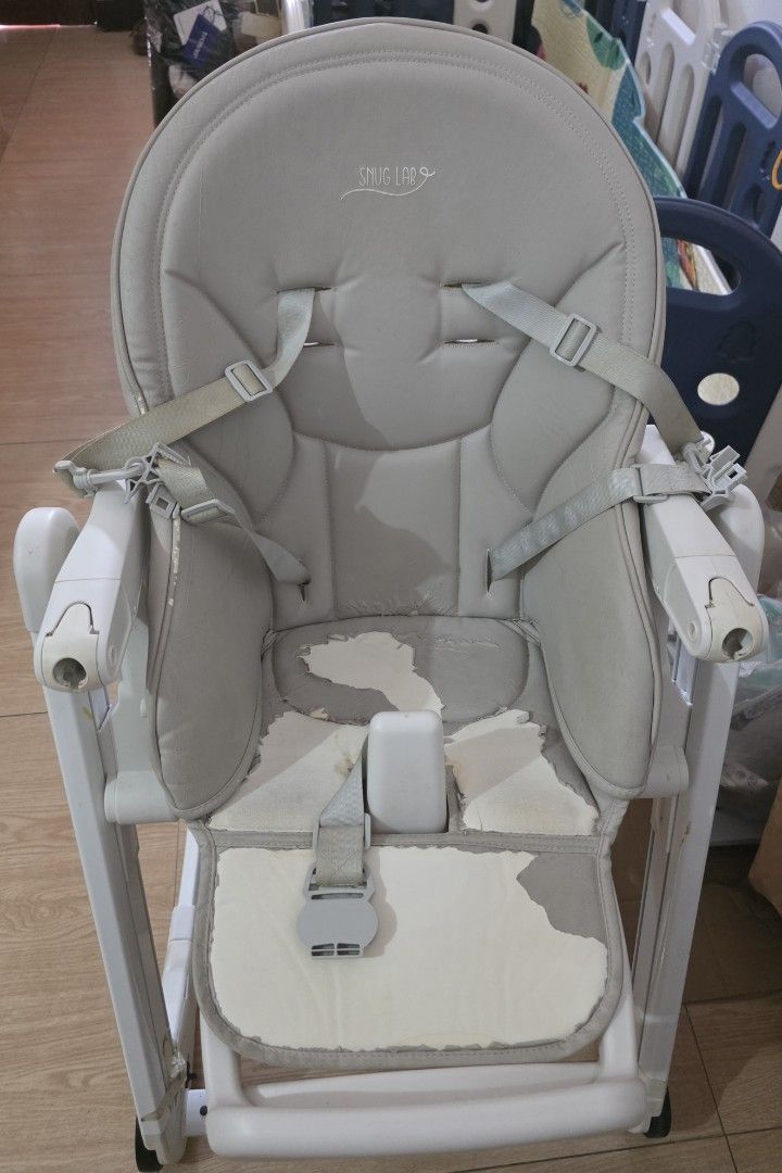 Used 5in1 Snug Lab High Chair (Category: Baby High Chairs) located in Manila. Submitted by pre.loved.declutterx (Listing ID 1438907120, Image 2). Description: - 5in1 Snug Lab High Chair (Rocking, With wheels, space saver, adjustable height) - Includes tray and safety harness - Color: White and gray - Seat cushion with wear and tear - Price: ₱1,500.