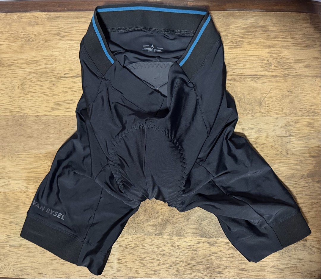 Van Rysel Road Cycling Shorts - L (Category: Activewear) located in Bacoor. Submitted by cristine.10 (Listing ID 1438985947, Image 1). Description: - Van Rysel bibless road cycling shorts - Color: Black - Size: L - Features a padded chamois for comfort - Blue accent on the waistband - Designed in France - Specifically for road cycling - Van Rysel logo on the leg Fitted once Unused/Brand New RFS: wrong size.