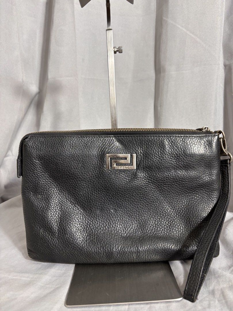 Versace Leather Bag (Category: Luxury Bags & Wallets) located in Manila. Submitted by earlylifecrisis3 (Listing ID 1438935246, Image 2). Description: Condition 8.5/10 Measure it by inch Width: 11 Length: 7.5 Depth: 1 Handle: 8 •Refund / Returns not allowed allowed •Please do check the dimensions size on labels sometimes are not accurate on the sizing •Ask me before purchasing.