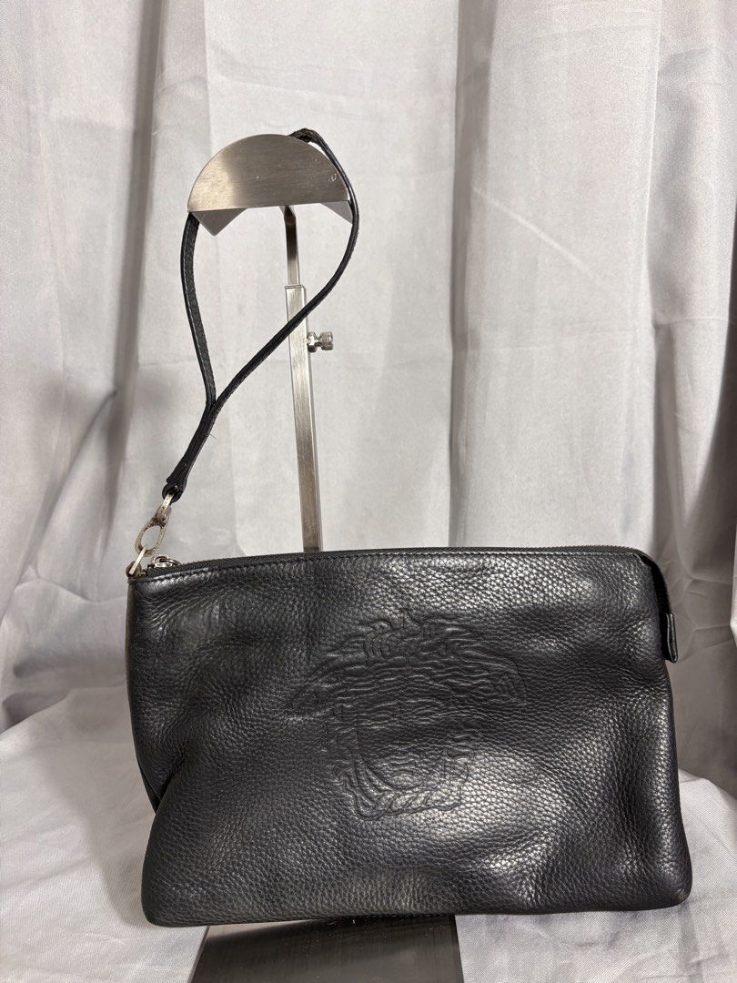 Versace Leather Bag (Category: Luxury Bags & Wallets) located in Manila. Submitted by earlylifecrisis3 (Listing ID 1438935246, Image 1). Description: Condition 8.5/10 Measure it by inch Width: 11 Length: 7.5 Depth: 1 Handle: 8 •Refund / Returns not allowed allowed •Please do check the dimensions size on labels sometimes are not accurate on the sizing •Ask me before purchasing.