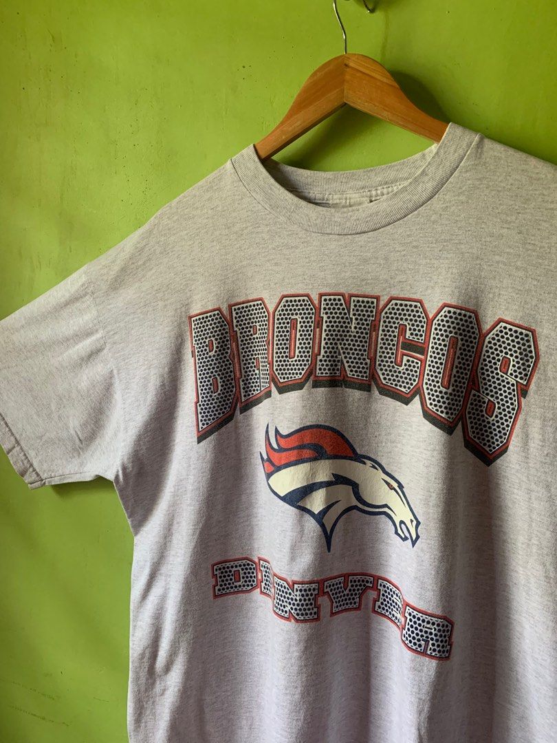 Vintage 1990s Denver Broncos NFL tee (Category: Tshirts & Polo Shirts ) located in Cagayan de Oro. Submitted by premium_thrifts (Listing ID 1438911949, Image 2). Description: Gray colorway. Good condition. Issues: slight crackprint, slight yellowing on the front collar, and on some parts - MEASUREMENTS: L29" x W25" 24" (shoulder to shoulder) 9.2" (sleeve length) Fits 2XL Add shipping fee (via JRS or J&T).