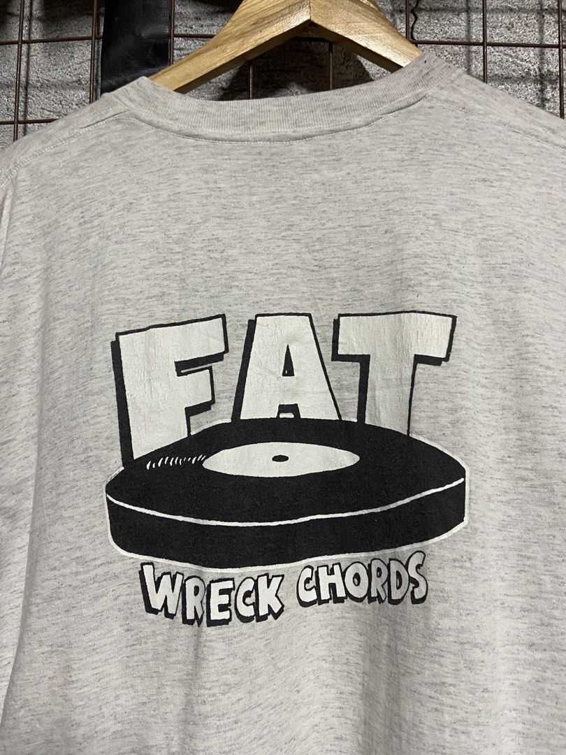 VINTAGE NOFX Fat Wreck Chords (Category: Tshirts & Polo Shirts ) located in Binan City. Submitted by doze16 (Listing ID 1439038249, Image 3). Description: - Vintage NOFX band t-shirt - Features "White Trash, Two Heebs, and a Bean" album art on the front - Includes Fat Wreck Chords logo on the back - Made by Oneita Power/50 Plus - Made in Mexico - Dated 1993 - Epitaph label.