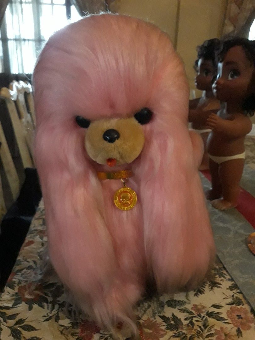 Vintage Rare Japanese Bandai Pink Poodle Stuffed Toy with Gold Tag (Category: Toys & Games) located in Paranaque City. Submitted by luisayap0306 (Listing ID 1438912309, Image 2). Description: - VINTAGE RARE JAPAN BANDAI pink poodle - Features soft, plush exterior - Cute and cuddly face - Includes gold tag with "POUREE ANIMAL SHISHA" inscription - Designed with long, fluffy fur - Small, round head it only needs cleaning kasi nabasag un mirror glas