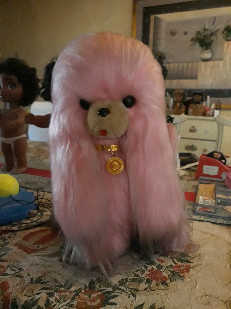Vintage Rare Japanese Bandai Pink Poodle Stuffed Toy with Gold Tag (Category: Toys & Games) located in Paranaque City. Submitted by luisayap0306 (Listing ID 1438912309, Image 1). Description: - VINTAGE RARE JAPAN BANDAI pink poodle - Features soft, plush exterior - Cute and cuddly face - Includes gold tag with "POUREE ANIMAL SHISHA" inscription - Designed with long, fluffy fur - Small, round head it only needs cleaning kasi nabasag un mirror glas