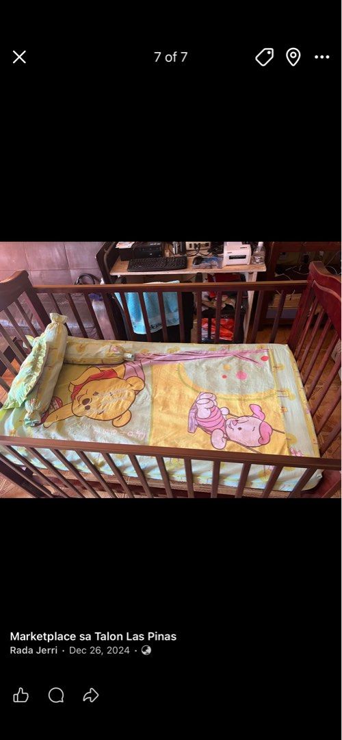 Wooden Baby Crib (Category: Cots & Cribs) located in Las Pinas. Submitted by jerri44 (Listing ID 1439007451, Image 3). Description: - Wooden baby crib - not included mattress and Winnie the Pooh bedsheet - Dark brown finish - Features wheels for easy movement - Vertical slats for safety and visibility - Perfect for babies and toddlers.