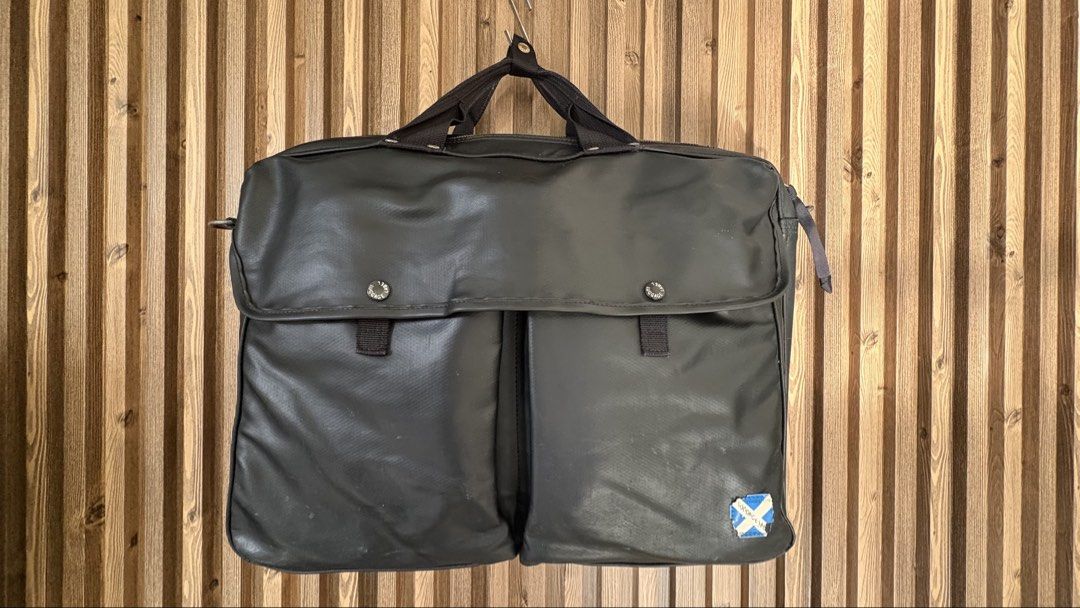 Yoshida Luggage Label Expandable Black Briefcase (Category: Briefcases) located in Dasmarinas. Submitted by 8ocho8 (Listing ID 1438900639, Image 1). Description: Yoshida Luggage Label Expandable Black Briefcase - Made in Japan - Expandable - Heavily used but still usable - Comes with the removable stiffener pad - Missing shoulder strap - All buttons/snaps and zippers are in fair condition and working - Has some scuff and hole on the edges due to 
