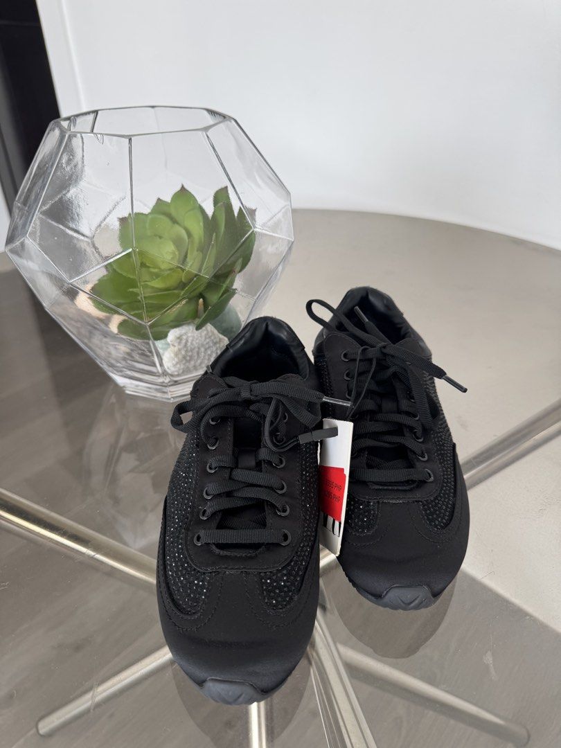 Zara Black Embellished Sneakers (Category: Sneakers) located in Taguig. Submitted by kittychum (Listing ID 1439010341, Image 1). Description: 💯 AUTHENTIC - Zara black sneakers - Size 36 - Embellished detailing - Lace-up closure - Rubber sole - Made of satin-like material - Preloved used twice.