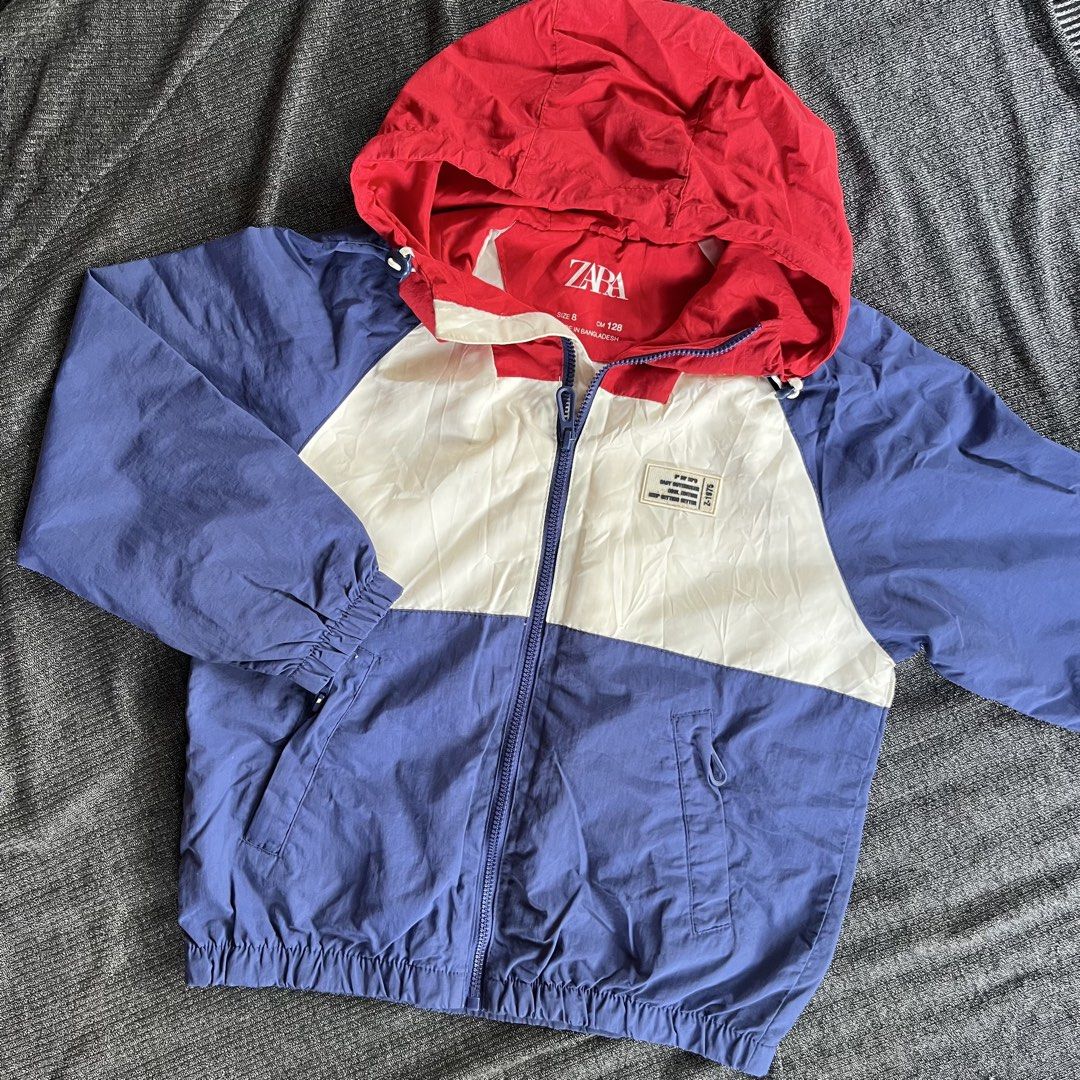 Zara Kids Colorblock Jacket Size 8 (Category: Babies & Kids Fashion) located in Dumalinao. Submitted by sweeteapie (Listing ID 1438901101, Image 1). Description: with flaws but not that visible (See attached photos) - Zara kids colorblock jacket - Features: - Red hood - White center panel - Blue sleeves - Full zipper closure - Chest patch detail - Size 8 - Made in Bangladesh - Condition: Tear on left sleeve, small paint on hoodie .