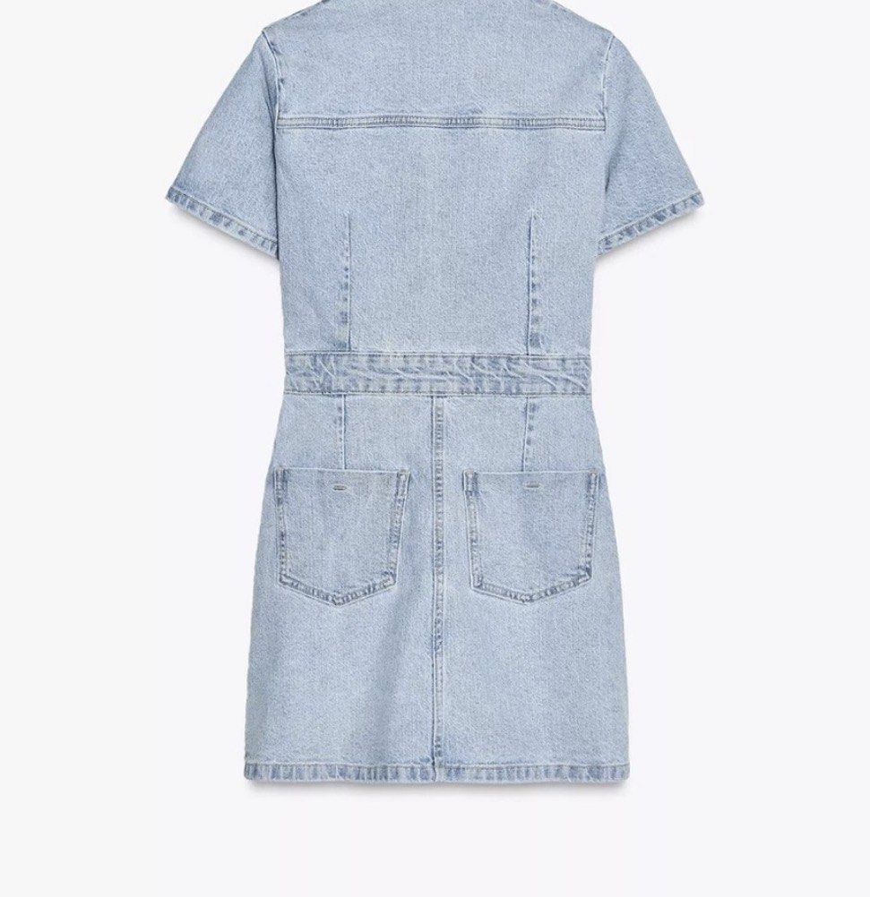 Zara Light Blue Denim Mini Dress (Category: Dresses) located in Manila. Submitted by urbantrendsetter (Listing ID 1439035237, Image 2). Description: Ladies Zara Light Blue Z1975 Denim Mini Dress. Dress with a Johnny collar and turn-up short sleeves. Front pockets and rear patch pockets. Faded effect. Lightly distressed around the neckline and pockets..