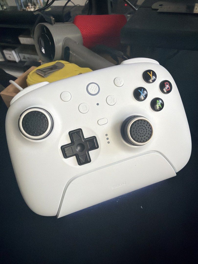 8BitDo Ultimate 2 Wireless Controller (Category: Controllers) located in Singapore. Submitted by brotherdrammer (Listing ID 1439163701, Image 1). Description: - 8BitDo Ultimate 2 wireless controller - previous flagship model from 8bitdo - Left Trigger sticking sometimes when pressed - otherwise, all good - Includes all buttons and joysticks - includes charging stand and usb cable - Ideal for gaming at home or on the go - Comes without original pa