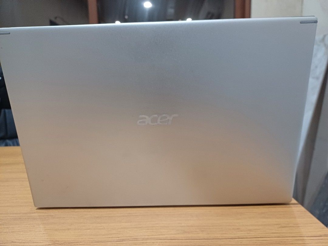Acer Aspire 5 Laptop (Category: Laptops & Notebooks) located in Daet. Submitted by delacruzke58368 (Listing ID 1439071097, Image 2). Description: - Acer laptop - Intel Core i5-1135G7 processor - 16GB RAM - 477GB SSD - 2GB Graphics Card GeForce MX350 - 1080p Display - Silver Finish - Standard Black Keyboard - 15.6 inch display Issue: May dents na sa laptop and nabura na yung sticker. May maliit na white spot din sa LCD. Sabog na rin ang speaker ka