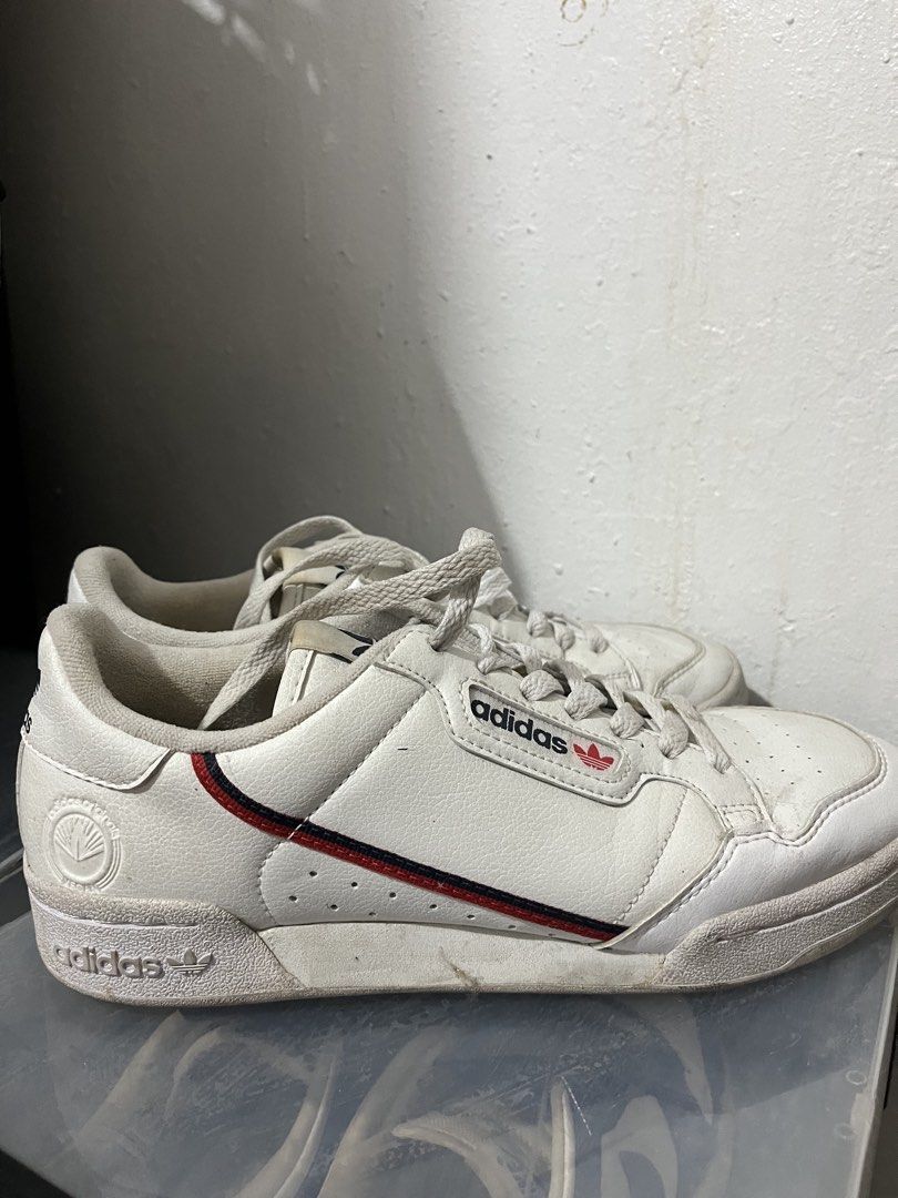 Adidas Continental 80s White Sneakers (Category: Sneakers) located in Cainta. Submitted by lmadzz (Listing ID 1439145374, Image 2). Description: - Adidas Continental 80s sneakers - Color: White - Adidas logo on tongue and side - Red and navy stripes detail - Round toe design - Lace-up closure - White soles -Used twice -needs cleaning lang.