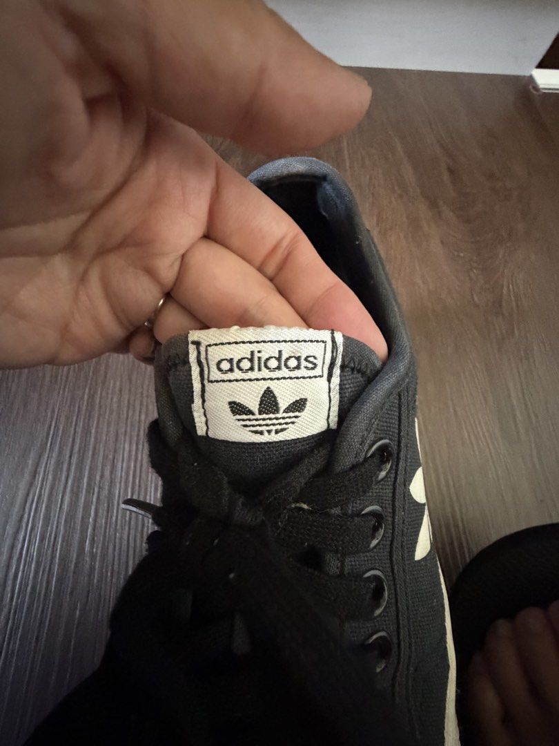 Adidas Nizza Low Black Sneakers (Category: Sneakers) located in Malabon City. Submitted by onyshandicrafts (Listing ID 1439088555, Image 3). Description: - Adidas Nizza Low sneakers - Color: Black - Size: US 5, UK 4.5, FR 37 1/3, JP 230, CHN 230 - Features Adidas logo - Made in Vietnam - Black laces, white sole - Needs cleaning.