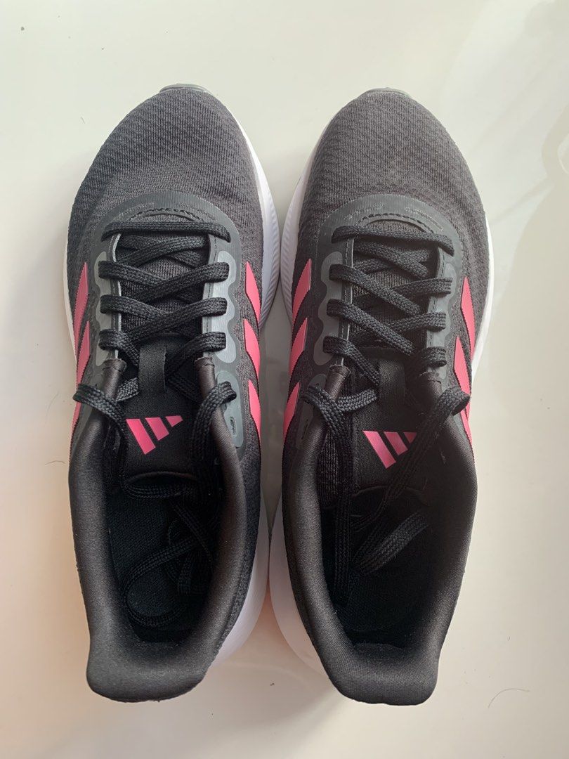 BER month Sale: Adidas RunFalcon Shoes (Category: Sneakers) located in Mandaluyong City. Submitted by bvnantes (Listing ID 1439138183, Image 3). Description: - Adidas Runfalcon 3.0 Women running shoes - Black and pink color scheme - Size: US 6.5 / UK 5 / 23.5 to 24CM - Features classic Adidas stripes - White sole - Perfect for running or casual wear - Mode of payment is via BPI/BDO QR code or Gcash. CoD is via Lalamove and delivery shouldered by 