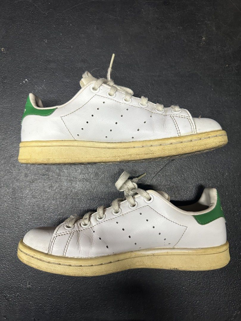 Adidas Stan Smith White Green Sneakers (Category: Sneakers) located in Quezon City. Submitted by plzdeclutter (Listing ID 1439218528, Image 1). Description: - Adidas Stan Smith sneakers - White upper with green heel tab - Cream-colored sole - Size: US 3.5, UK 3, FR 35 1/2, JP 220, CHN 215 - fits size 5 to 5.5 -no issue except yellowing of soles.