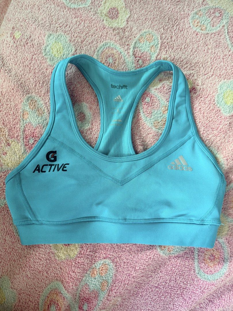 Adidas Techfit Sports Bra (Category: Activewear) located in Taguig. Submitted by che_f25 (Listing ID 1439148823, Image 1). Description: - Adidas Techfit sports bra - Vibrant blue color - Racerback style for support - Made with Climalite fabric - Adidas and G Active logos - Perfect for workouts and activities.