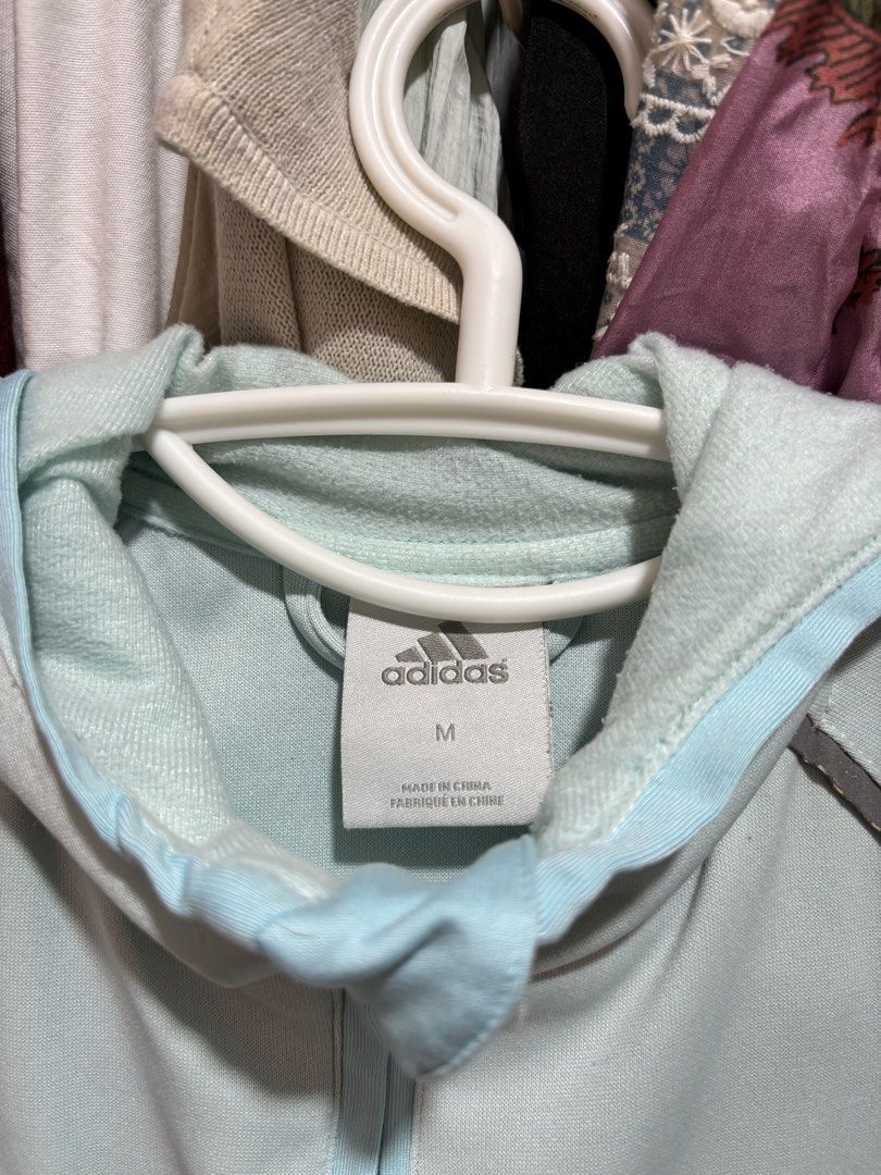 Adidas track jacket (Category: Coats, Jackets and Outerwear) located in Cabuyao City. Submitted by nevernotdecluttering (Listing ID 1439235593, Image 2). Description: decluttering issue: lost zipper pull, discoloration on sleeve hem, signs or wear on reflective strips has reflective strips will remove lint and fuzz prior shipping +70~ish for J&T's medium pouch first to pay basis.