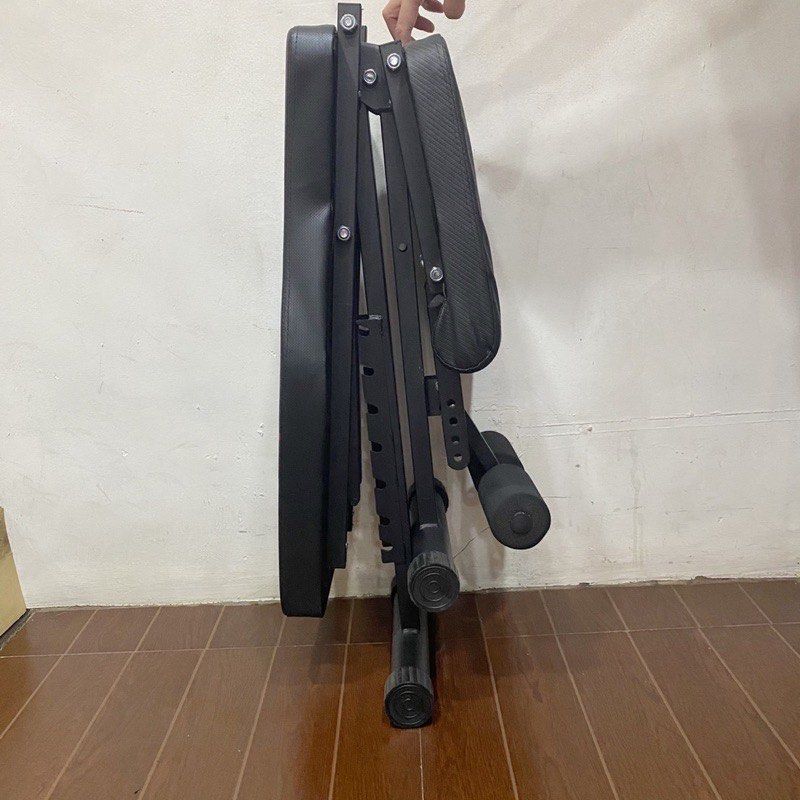 Adjustable Weight Bench (3in1) (Category: Weights & Dumbbells) located in Paranaque City. Submitted by joshsimon (Listing ID 1439193704, Image 3). Description: - Adjustable weight bench - Black seat with red accents - Sturdy black frame - Folds for easy storage - Adjustable angles for various exercises - Includes leg support.