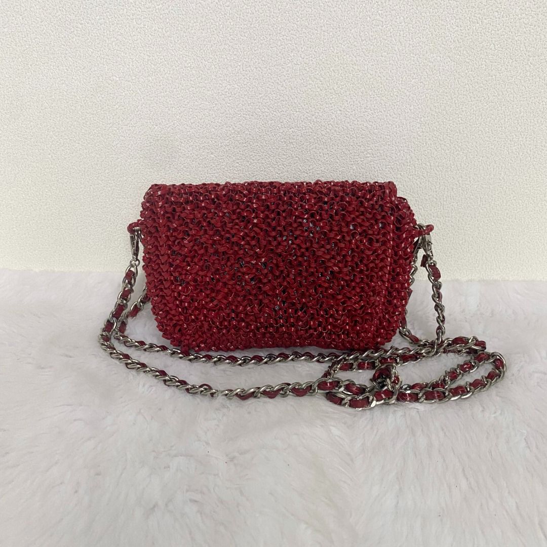 Anteprima Red Mini Crossbody Wire Bag (Category: Cross-body Bags) located in Cebu City. Submitted by posh_avenue888 (Listing ID 1439141670, Image 2). Description: In very good condition showing tolerable signs of wear (fading/scratches on the turn-lock closure). From Japan. Crafted in plastic wire. 100% authentic or your money back!!! 7.5" x 5.25" x 1.5". .