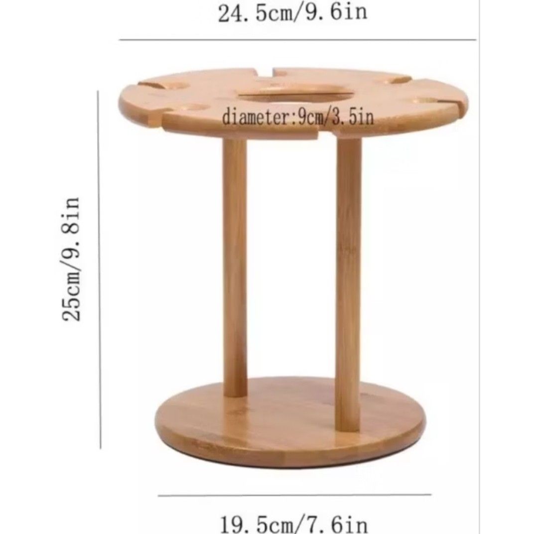 Bamboo Wine Glass Holder (Category: Other Kitchenware & Tableware) located in Quezon City. Submitted by jedcob011229 (Listing ID 1439069492, Image 3). Description: - Stylish bamboo wine glass holder - Holds up to 6 glasses - Easy to assemble - Includes screws and Allen wrench - Dimensions: - Top Diameter: 24.5cm - Base Diameter: 19.5cm - Height: 25cm -wine and glass not inculded.