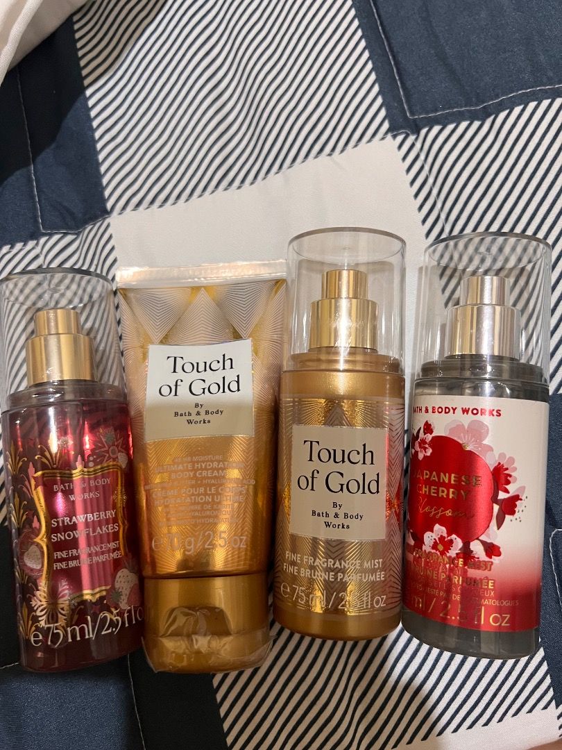 Bath & Body Works Travel Size (Category: Fragrance & Deodorants) located in Angono. Submitted by elyenitty_ (Listing ID 1439192240, Image 1). Description: - Bath & Body Works Set - Includes: - Touch of Gold Fine Fragrance Mist - Touch of Gold Body Cream (Gold Packaging) - Strawberry Snowflakes Fine Fragrance Mist (Red/White Design) - Ideal for those who enjoy scented body care products. Selling price is at per piece and not for bundle or take all