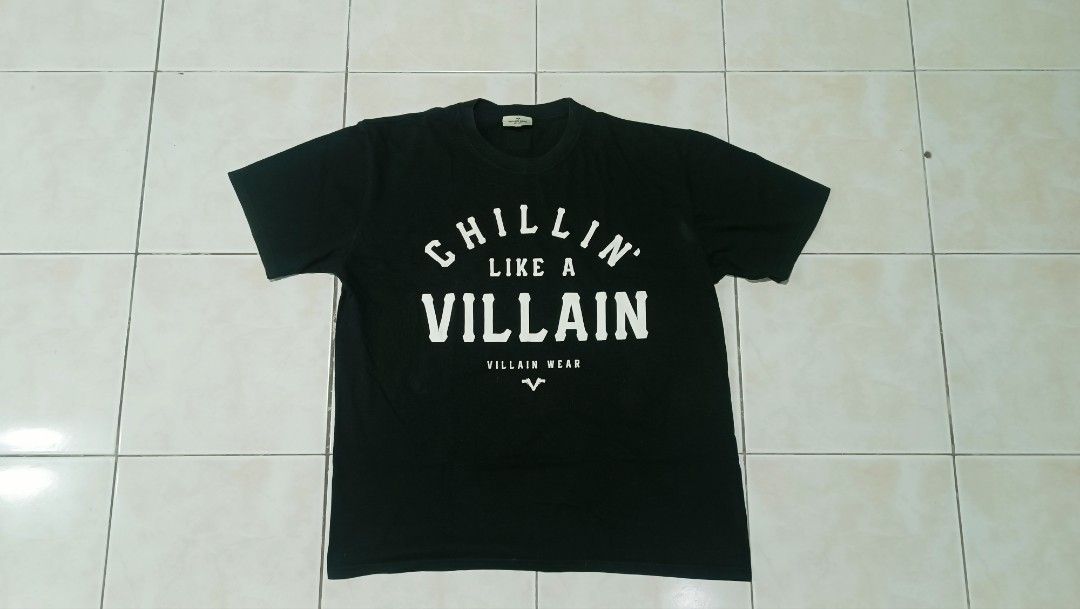 Bieber Purpose Tour T-shirt (Category: Tshirts & Polo Shirts ) located in Manila. Submitted by rmflores888 (Listing ID 1439114187, Image 3). Description: - Beige Bieber Purpose Tour shirt with front graphic and "BIEBER" on the back. - Black t-shirt with "CHILLIN' LIKE A VILLAIN" print. - Both shirts are short-sleeved..