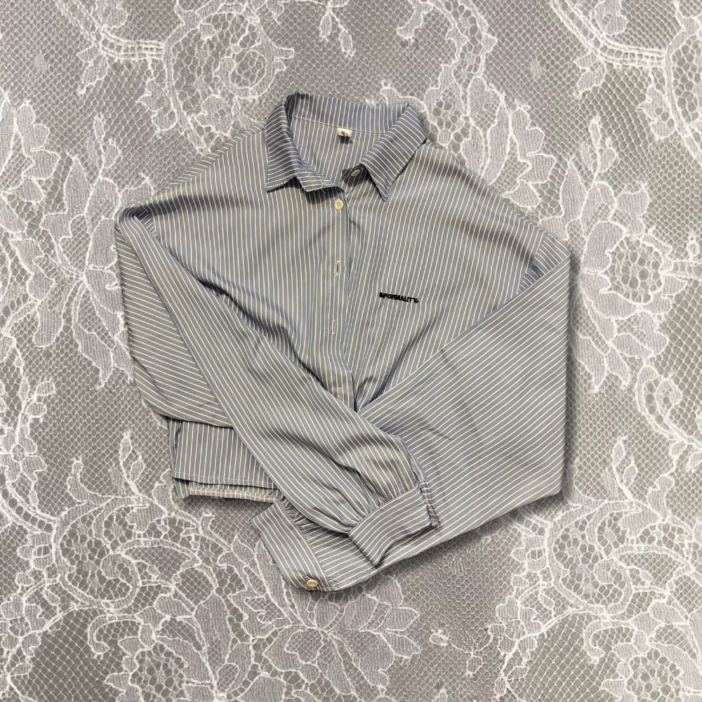 Blue Striped Polo Long Sleeve (Category: Coats, Jackets and Outerwear) located in Manila. Submitted by closetbyjmie (Listing ID 1439179597, Image 1). Description: ⋆. 𐙚˚࿔ Blue Striped Polo Long Sleeve 𝜗𝜚˚⋆ Classic striped polo-style top with a preppy feel. Great for layering or achieving an effortless clean-girl outfit. L : 18.5 inches W : 40 inches.