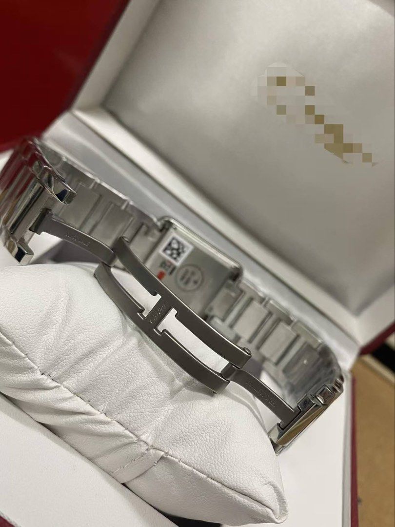 Cartier tank steel with extra strap (Category: Luxury Watches) located in San Juan City. Submitted by wristcheckdiaries (Listing ID 1439093556, Image 3). Description: - Big and small available - silver and gold available -easy to change strap - Authentic Cartier watch box - Deep red with gold trim - Includes: Cartier tag, Swiss International Guarantee card.