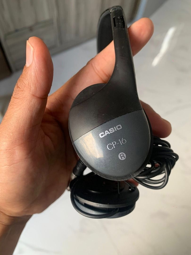 Casio CP-16 Headphones (Category: Headphones & Headsets) located in Caloocan City. Submitted by kandmshop (Listing ID 1439237103, Image 3). Description: - Casio CP-16 headphones - 3.5mm jack - Color: Black with gray ear cups - Coiled cable - Condition: Good.