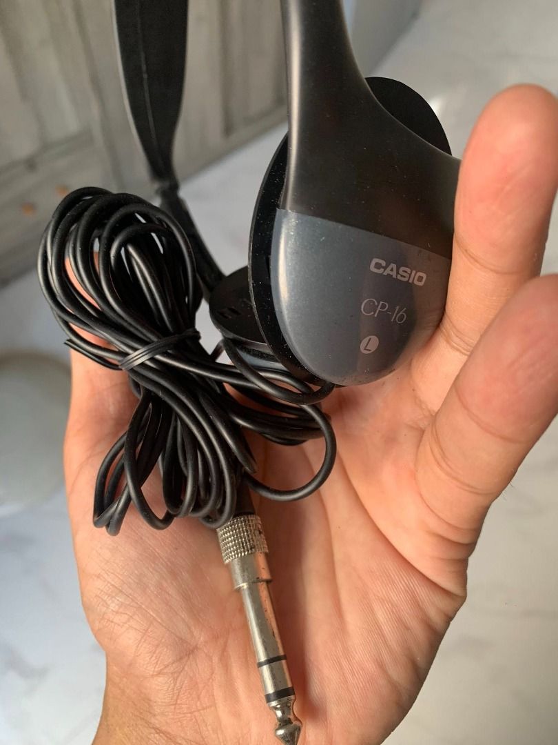 Casio CP-16 Headphones (Category: Headphones & Headsets) located in Caloocan City. Submitted by kandmshop (Listing ID 1439237103, Image 1). Description: - Casio CP-16 headphones - 3.5mm jack - Color: Black with gray ear cups - Coiled cable - Condition: Good.