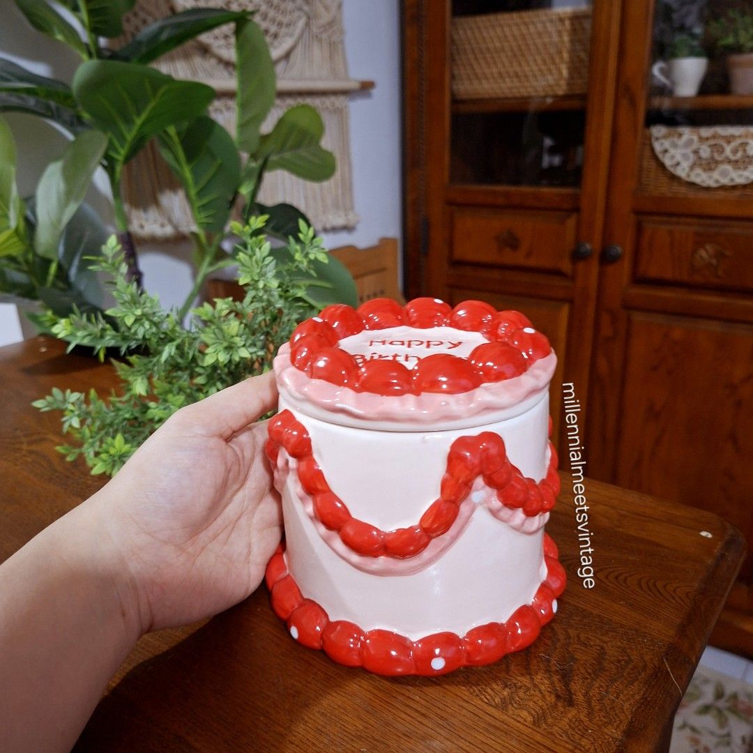 Ceramic birthday cake canister with lid (Category: Other Home Decor) located in Dasmarinas. Submitted by millennialmeetsvintage (Listing ID 1439210975, Image 2). Description: 2pcs available last price posted, no haggling 🙅🏻‍♀️ 🌍ships from DASMA, CAVITE 🚚 shipping via Lalamove only ❌no reservations, first-to-pay basis ❌no physical store, no walk-ins ❌no COD transactions.