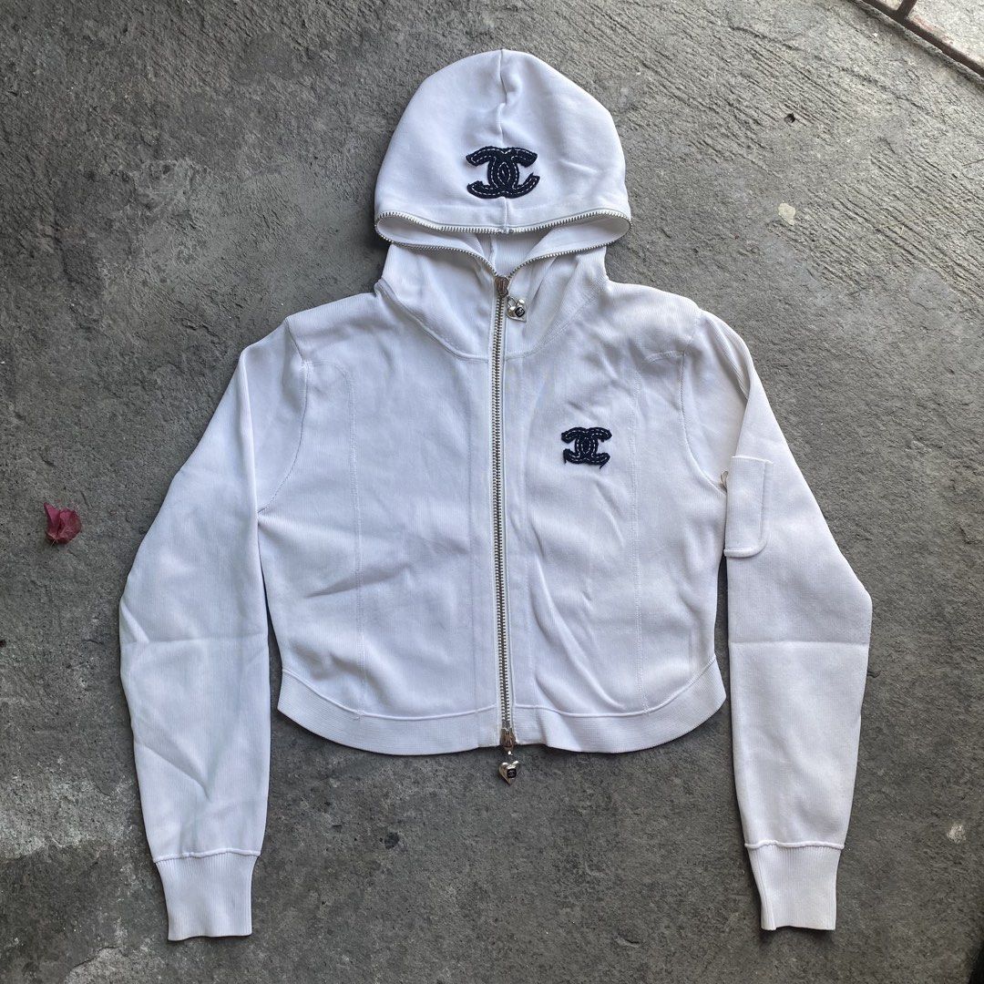 Chanel cropped zip-up hoodie (Category: Coats, Jackets and Outerwear) located in Tanza. Submitted by holy.thrift (Listing ID 1439087890, Image 2). Description: Chanel cropped zip-up hoodie Size: Small-Medium (stretchy) Dimes: W: 19 L: 20 Heavy cloth Silvers are still good no tarnish No stains Condition: 10/10 Color rate: 10/10 No issue No wash tags.