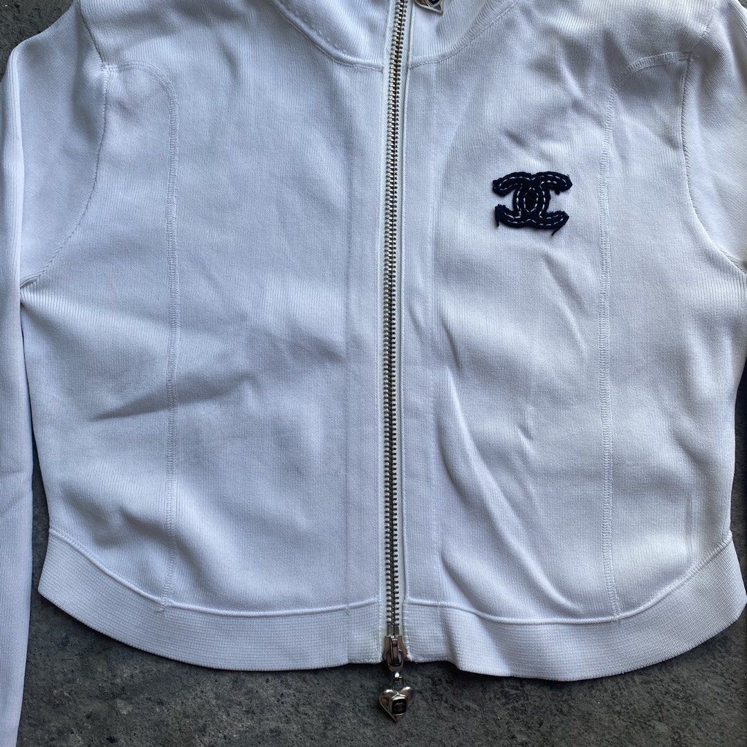 Chanel cropped zip-up hoodie (Category: Coats, Jackets and Outerwear) located in Tanza. Submitted by holy.thrift (Listing ID 1439087890, Image 3). Description: Chanel cropped zip-up hoodie Size: Small-Medium (stretchy) Dimes: W: 19 L: 20 Heavy cloth Silvers are still good no tarnish No stains Condition: 10/10 Color rate: 10/10 No issue No wash tags.