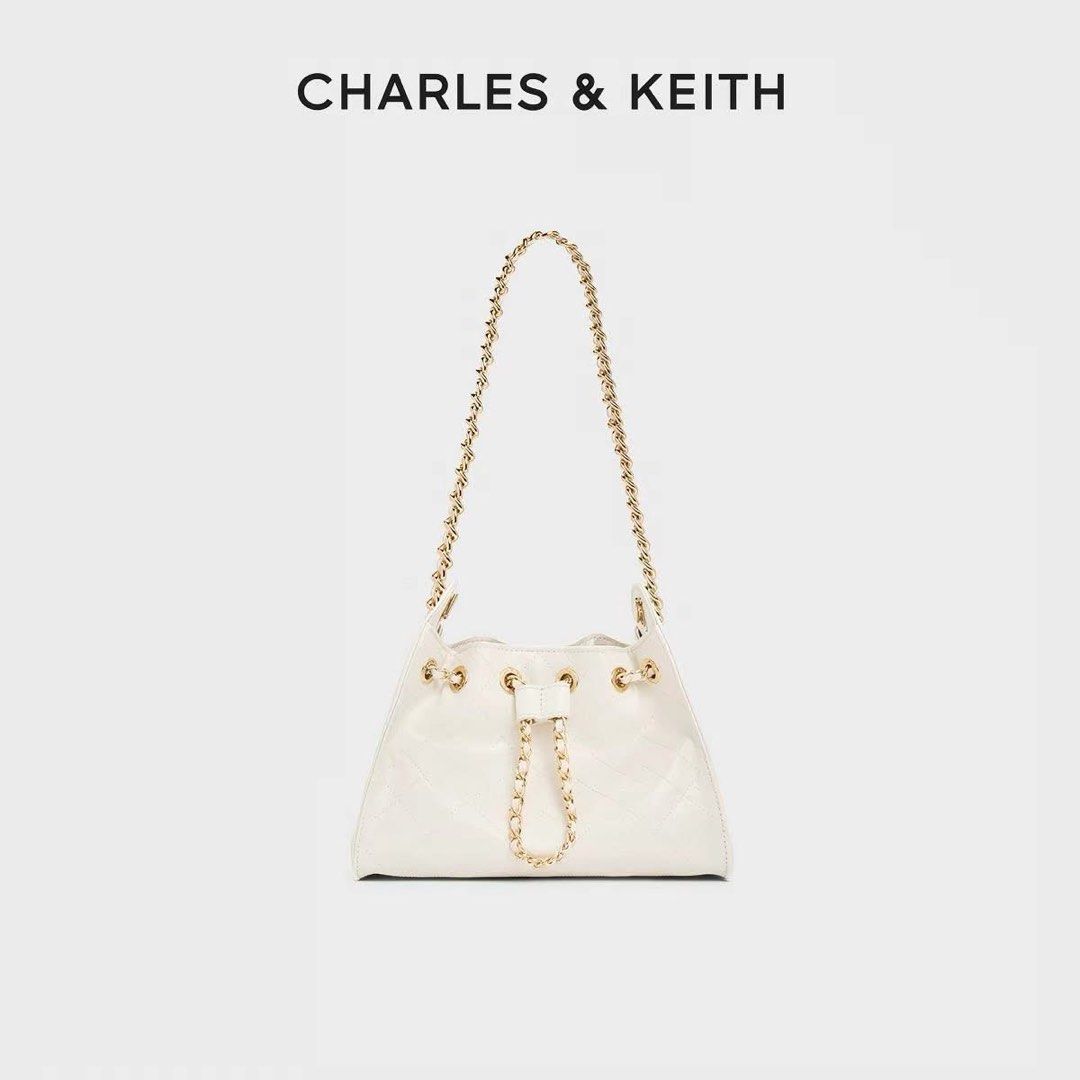 Charles and Keith Duo Quilted Drawstring Bucket Bag (Category: Shoulder Bags) located in Taguig. Submitted by poshcity (Listing ID 1439075866, Image 2). Description: ✨PLEASE MAKE READING A HABIT✨ INCLUSIONS: ✨: With Tag ✨: 21*15.5*12 size ✨: What you see is what you get ✨: Manage your expectations. Items are all MPO/Mall Pull Out — ✔️: Sure buyers only should fill up the form, No form No item. ✔️: Payment first policy. No COD & COP. .