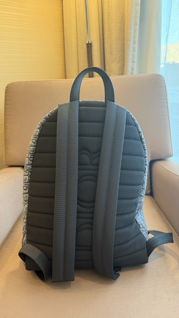 Christian Dior Oblique Backpack (Category: Luxury Bags & Wallets) located in Paranaque City. Submitted by manilaxray (Listing ID 1439236039, Image 2). Description: - Christian Dior Oblique Backpack - Iconic Dior Oblique pattern - Top handle and adjustable shoulder straps - Padded back for comfort - Front pocket and main compartment - Christian Dior logo visible - Authentic 💯 -with box - bought in USA for almost 170k in pesos -can meet up in Dior