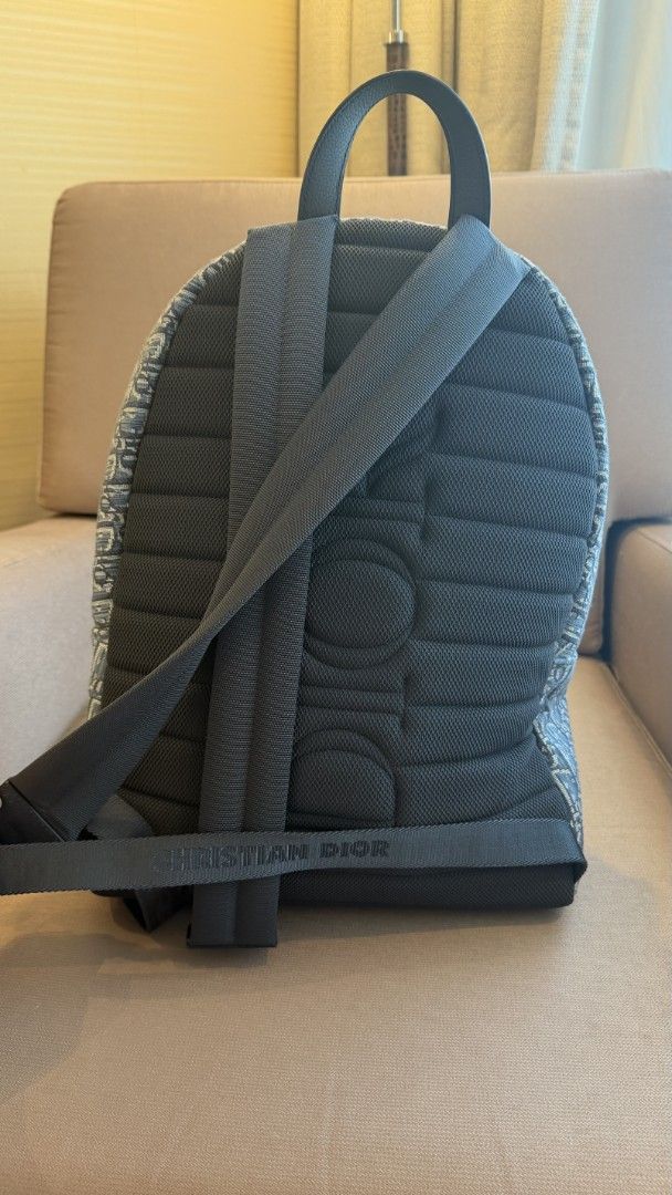 Christian Dior Oblique Backpack (Category: Luxury Bags & Wallets) located in Paranaque City. Submitted by manilaxray (Listing ID 1439236039, Image 3). Description: - Christian Dior Oblique Backpack - Iconic Dior Oblique pattern - Top handle and adjustable shoulder straps - Padded back for comfort - Front pocket and main compartment - Christian Dior logo visible - Authentic 💯 -with box - bought in USA for almost 170k in pesos -can meet up in Dior