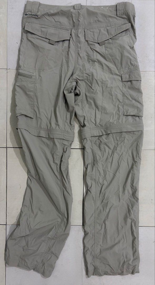 Columbia Convertible Pants (Category: Trousers) located in Manila. Submitted by iskalabooming (Listing ID 1439217649, Image 2). Description: - Columbia convertible pants - Neutral color - Zip-off design for shorts - Multiple pockets, including cargo pockets - Lightweight, quick-drying material - Columbia logo detail - Perfect for outdoor adventures - small oil stain.