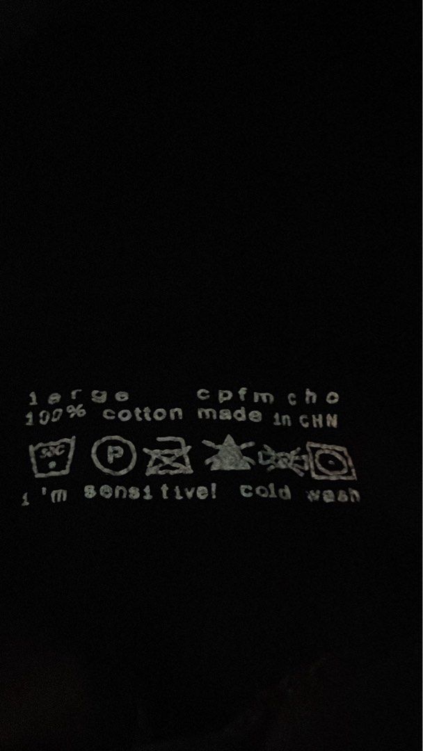 CPFM True Love Hoodie - Large (Category: Hoodies) located in Makati City. Submitted by kzisdeclutter (Listing ID 1439246000, Image 2). Description: - Black hoodie - "True Love" graphic on front, "is hard to find" on back - Heart design with smiley faces and stars - Size: Large - Material: 100% cotton - Care: Cold wash, "I'm sensitive!" .