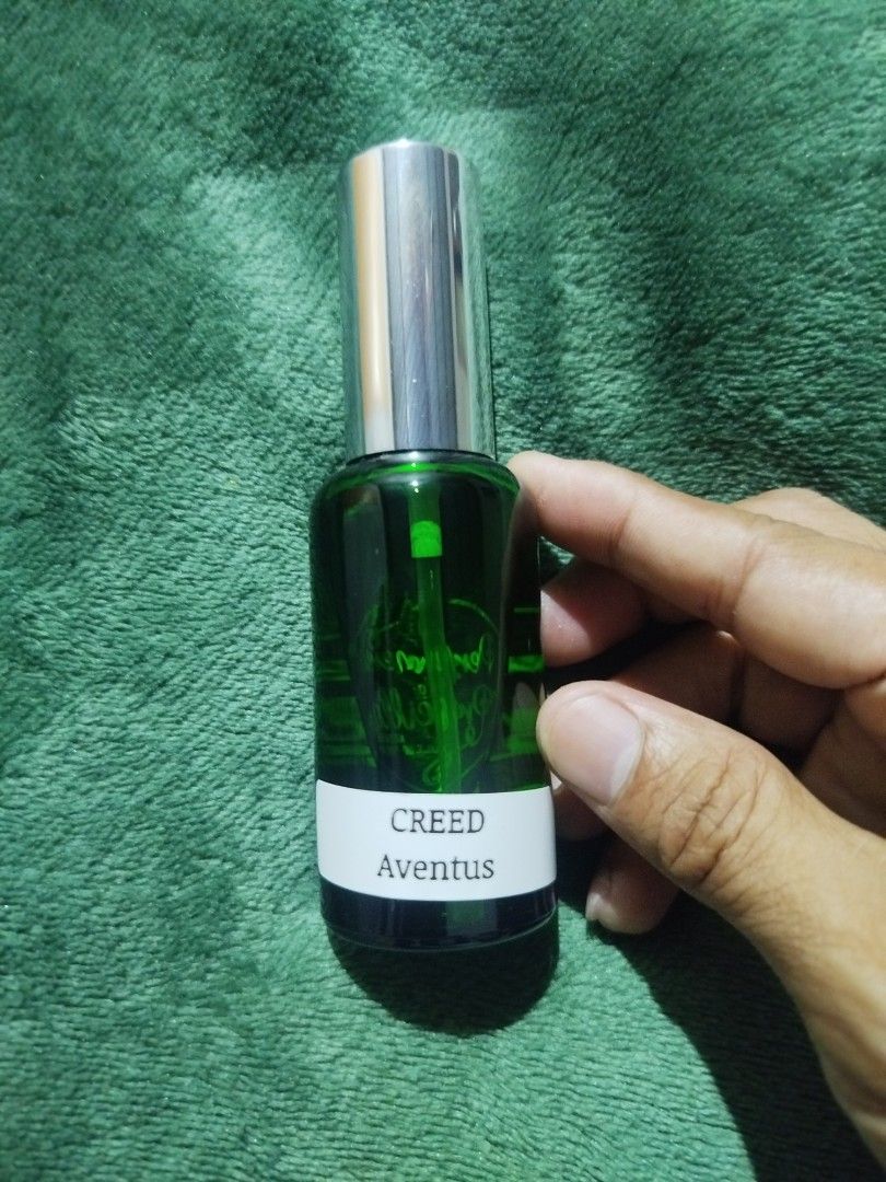 Creed Aventus Perfume (Category: Fragrance & Deodorants) located in Manila. Submitted by daddyong259778 (Listing ID 1439186155, Image 3). Description: - Creed Aventus perfume - Travel size bottle - Dark green glass bottle - Silver cap - Authentic product meet up para try muna Bago bayad 50ml available agua de gio amouage sunshine man.
