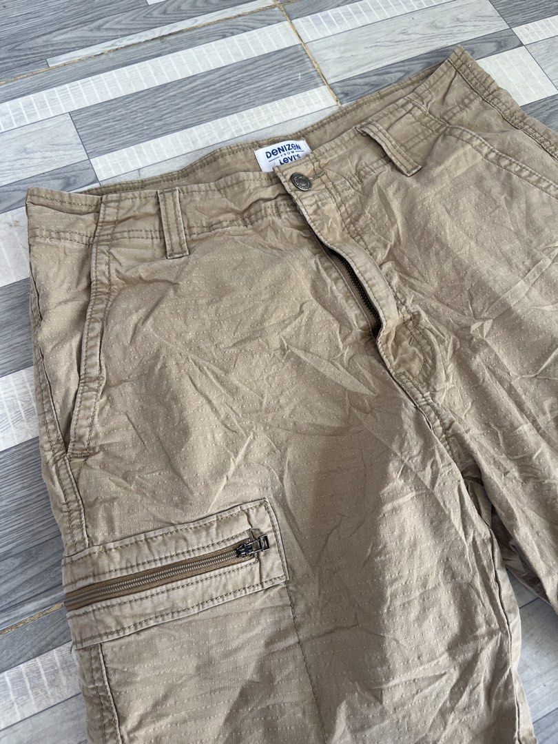 Denizen from Levi's Cargo Shorts (Category: Shorts) located in Sultan Kudarat. Submitted by c_jay28 (Listing ID 1439113734, Image 2). Description: - Denizen by Levi's cargo shorts - Size: 30 - Color: Brown - Features: - Multiple pockets - Zippered side pockets - Cargo pockets - Closure: Button and zipper - Style: Classic, casual.